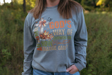 Load image into Gallery viewer, God&#39;s Way Of Showing Us LONG SLEEVE tee
